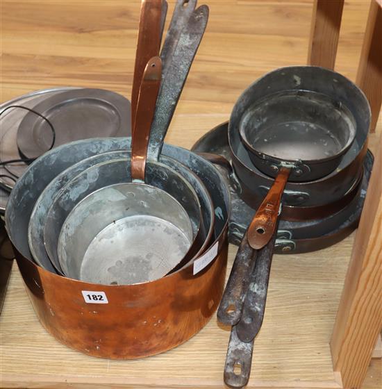 A quantity of copper cooking pans and other metalware including brass and pewter